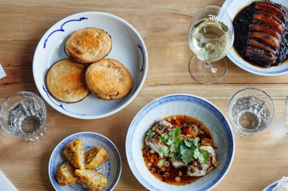 Clockwise from top left: Mapo tofu jaffles, moy choy (pork belly with mustard greens), pepper beef tartare, steamed barramundi, and fried dumplings.