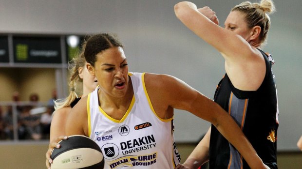 Liz Cambage of Melbourne Boomers drives to the basket in game three of the WNBL final series.