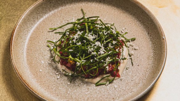 Retired dairy cow tartare with oyster cream and sorrel.