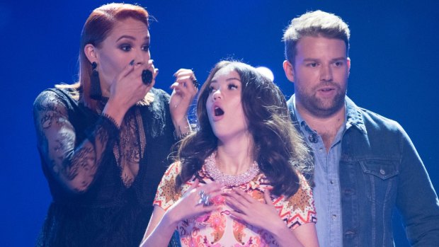 The face says it all: Lucy Sugerman on 'The Voice' after she was voted through on Sunday June 4.