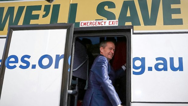 Opposition Leader Bill Shorten boards the campaign bus after a NDIS rally at the Northcott disability centre in Parramatta on Friday. 