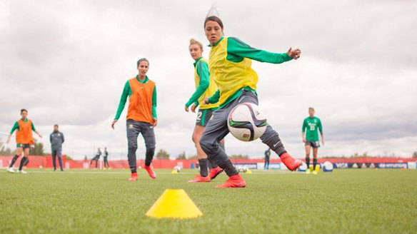 Focused: Australia's Sam Kerr tries to intercept a pass during training at the Women's World Cup in Edmonton, Canada.   