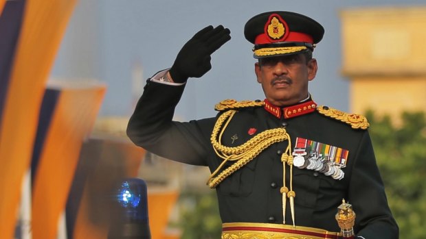 Sri Lanka's former army commander Sarath Fonseka salutes during his investiture ceremony as Field Marshal.