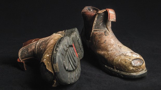 More than 2000 pairs of work boots were found in the man's home.