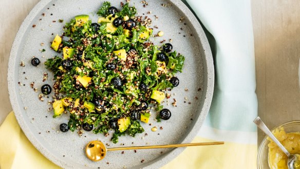 Kale, quinoa and blueberry salad with coconut dressing.