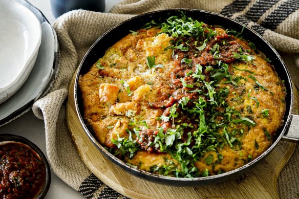 Potato gem-studded frittata with a stripe of  tomato salsa.