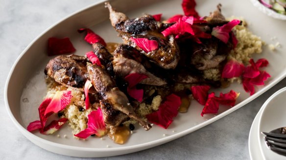 Quail with cous cous, rose petals & cucumber salad.