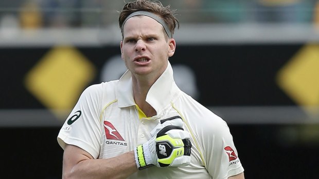All heart: Steve Smith thumps his chest after scoring his epic hundred