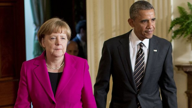 US President Barack Obama and German Chancellor Angela Merkel have spoken in Washington on their co-operation in tracking terror suspects. 
