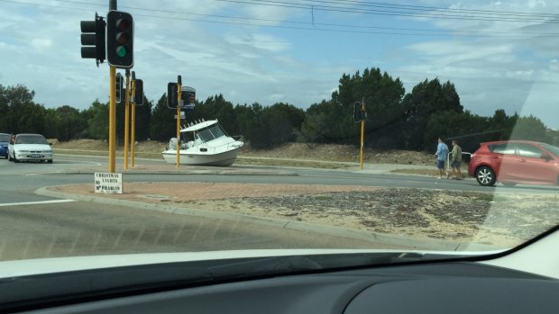 A boat ran aground - on Marmion Avenue in Qunns Rocks.