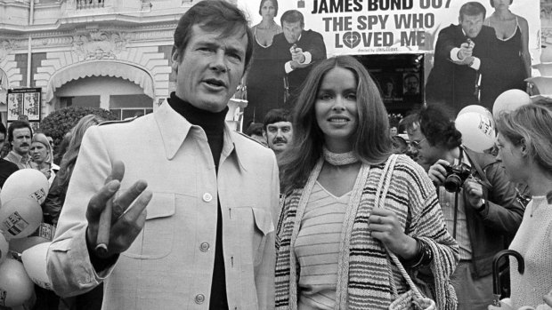 Roger Moore and co-star Barbara Bach at the screening of The Spy Who Loved Me at the 1977 Cannes Film Festival.