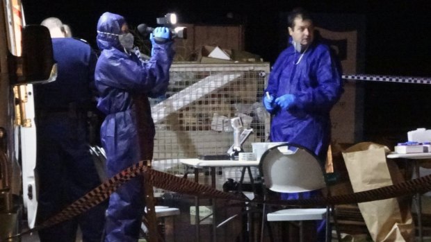 Forensic officers at the crime scene in Yanchep.