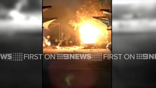Video captures a big explosion when a car gas bottle caught fire in the carpark of the Fairfield RSL Club.