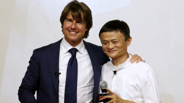 Tom Cruise and Alibaba chief executive Jack Ma, who has slipped to fourth on China's rich list, at the Shanghai premiere of Mission: Impossible – Rogue Nation.