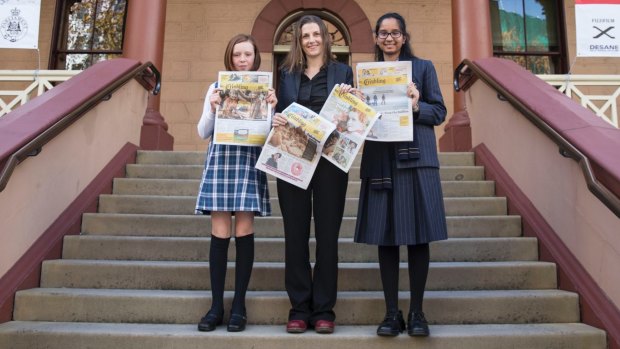 Grace Gregson, Saffron Howden and Dita Mehta campaign for Crinkling News in Sydney. 