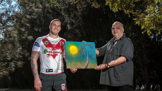 Indigenous through and through: Dragons forward Joel Thompson with artist Kevin Butler, who designed St George Illawarra's jersey last year.