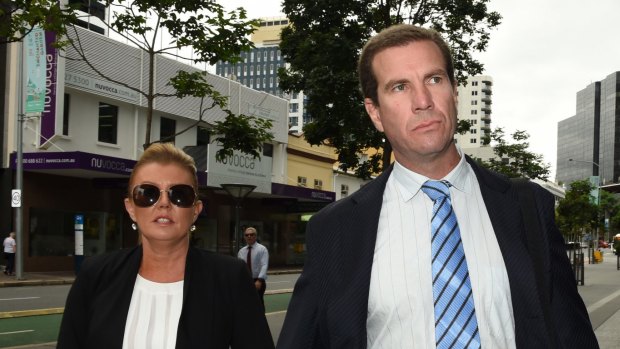 Former Billabong chief executive Matthew Perrin, arrives at court in December with his new partner, Belinda Otten (left) and his daughter.
