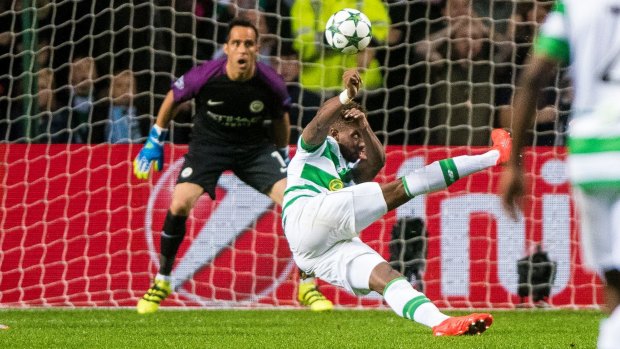 Celtic's Moussa Dembele scores his side's third goal.
