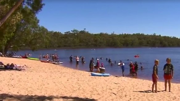 The lake was packed with people enjoying the public holiday. 