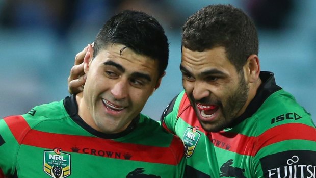Good score: Bryson Goodwin of the Rabbitohs, left, is congratualted by Greg Inglis after his try.