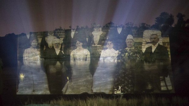 Photographs and paintings from the National Museum of Australia's collections are projected onto rolling fog and the waters of the Murrumbidgee River by artist-in-residence Vic McEwan and curator George Main. Ghostly faces of pioneers long past.