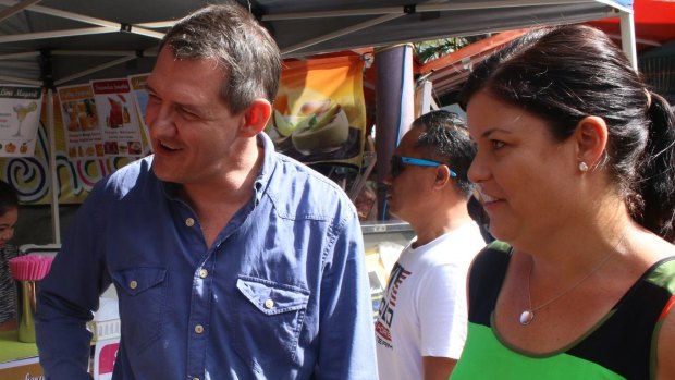 Northern Territory chief minister elect Michael Gunner and Attorney General Natasha Fyles (right) greet locals at Darwin's Nightcliff
Markets on Sunday morning,