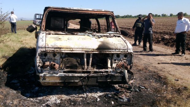 The burnt-out van registered to missing Australian surfer Adam Coleman.