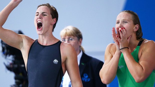 In full voice: Bronte Campbell (left) and Melanie Schlanger urged on their relay teammates as Australia powered to gold.