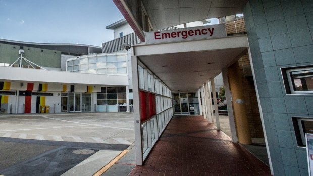 The man remains at Canberra Hospital after the two-car crash.