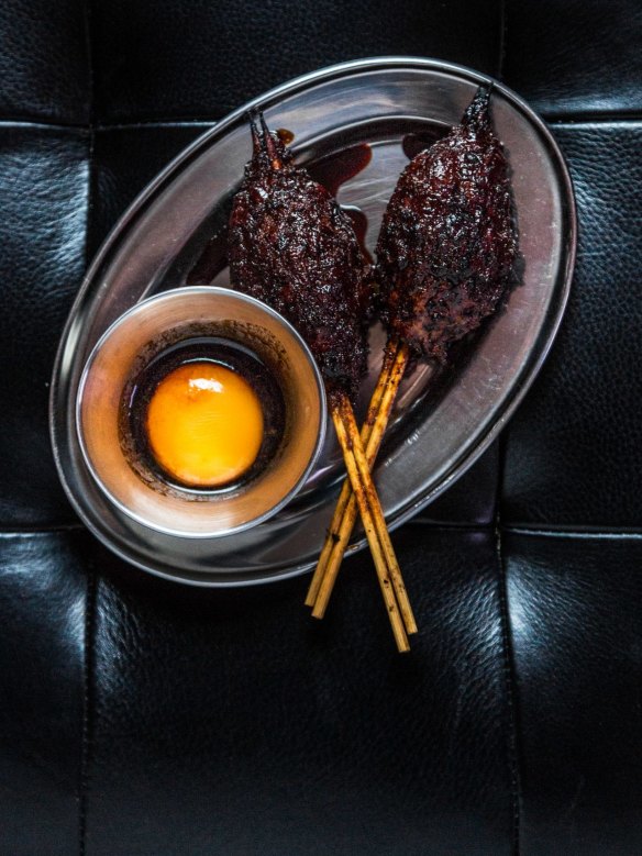 Duck meatball yakitori served with egg yolk and tare vinegar at Mono-XO, Fitzroy.