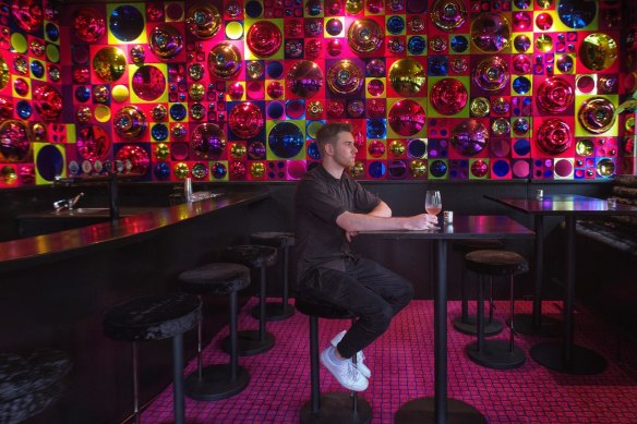 The pub's gaudy interior features 1800 wall-mounted glass domes.