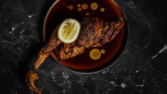 Go-to dish: Red-braised bird might be a half chicken with a gnarly foot to nibble on.