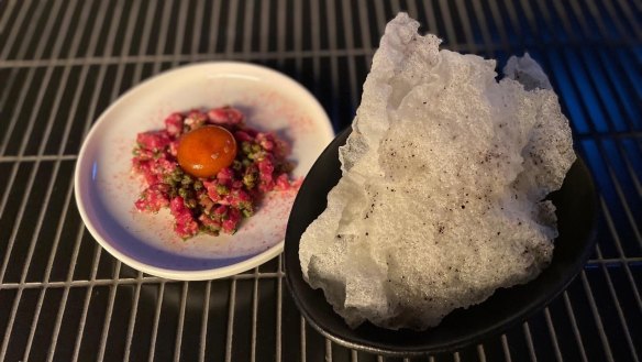 Beef tartare, muntries, Davidson plum, quail egg, Japanese crisps.