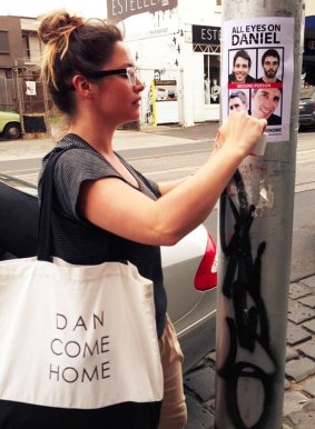 Daniel O'Keeffe's sister Loren putting up posters in Collingwood.