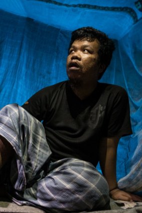 Azman Jantravadi, 27, has been chained by one leg in a corner of his family's barren wooden house.