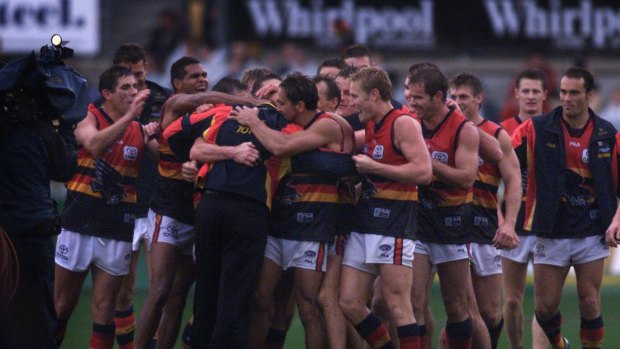 2001 AFL (Australian Football League) - Round 4 - Carlton versus Adelaide - Ground Optus Oval.    SPECIAL 1111 vjc010421.001.005  Pic VINCE CALIGIURI , The Age Newspaper ,

AFL football, Round 4 at Optus Oval  Carlton V Adelaide , Adelaide celebrate win with coach Gary Ayres after their upset win by 8 points