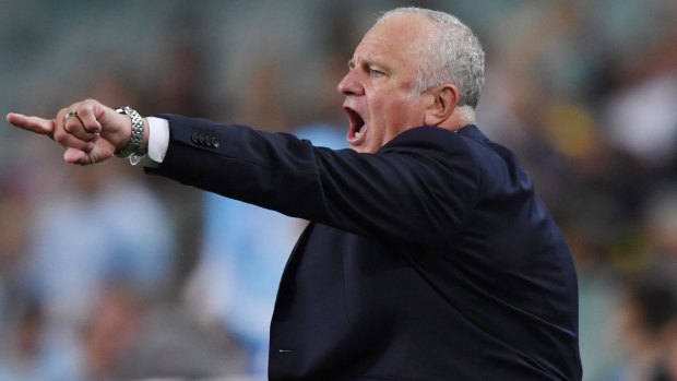 Out of the race: Graham Arnold will not be leaving the Sky Blues - at least not just yet.