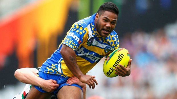 Injury scare: Chris Sandow is tackled during the Eels' match against the Rabbitohs in the Auckland Nines.