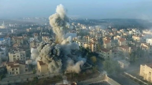 A still image taken from drone footage, posted online by the communications arm of the Ahrar al-Sham militant group, purports to show an air strike in Aleppo.