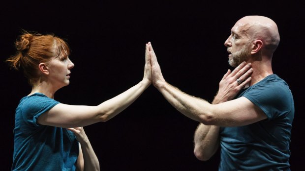 Jill Johnson and Christopher Roman work from the waist up, touching parts of their bodies that are usually forgotten in dance.