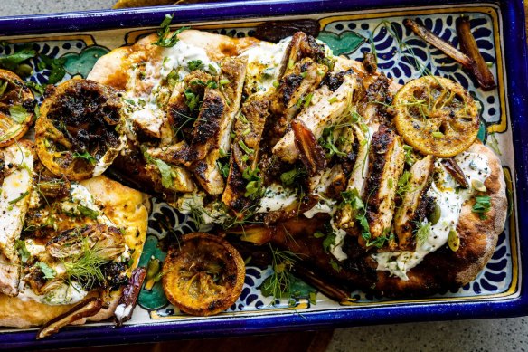 Flatbreads topped with chermoula marinated chicken, charred lemon, dates and tzatziki.