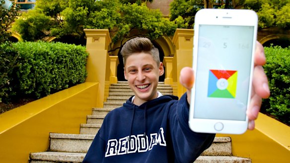 Surprise success: Ben Pasternak and his chart-topping iPhone game, <i>Impossible Rush</i>, outside Reddam House, Woollahra campus.