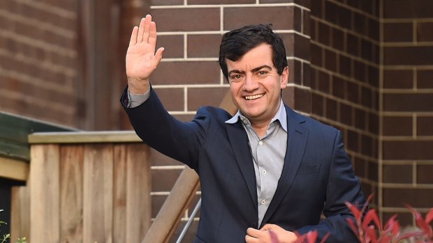 Senator Sam Dastyari leaves his home in Sydney on Wednesday morning before his press conference.