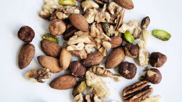 A half cup of mixed almonds, hazelnuts and walnuts daily was shown to make a difference.