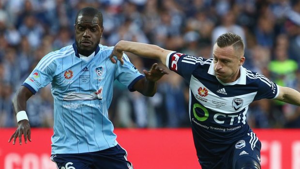 Re-signed: Sydney FC's Jacques Faty (left).