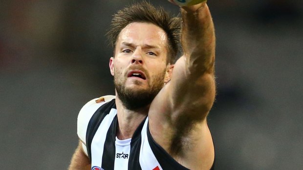Spoil sport: Magpie defender Nathan Brown on Friday night.