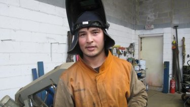 Connected: former refugee Zulfiqar Ali has found his dream job as a welder after completing an activities-based language course.