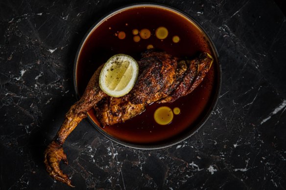 Go-to dish: Red-braised bird might be a half chicken with a gnarly foot to nibble on.