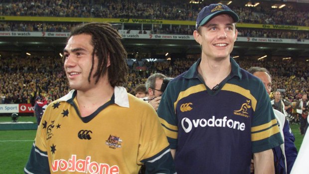 Special one: George Smith with Stephen Larkham after an Australian Test win over the British and Irish Lions in 2001.