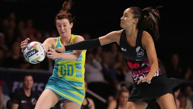 Dynamic: Maria Tutaia competes for the ball against Kate Shimmin in the final of the Fast5 Netball Series.
